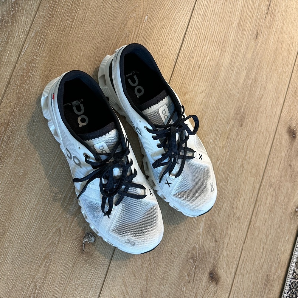 On Running White Sneakers with Black Accents